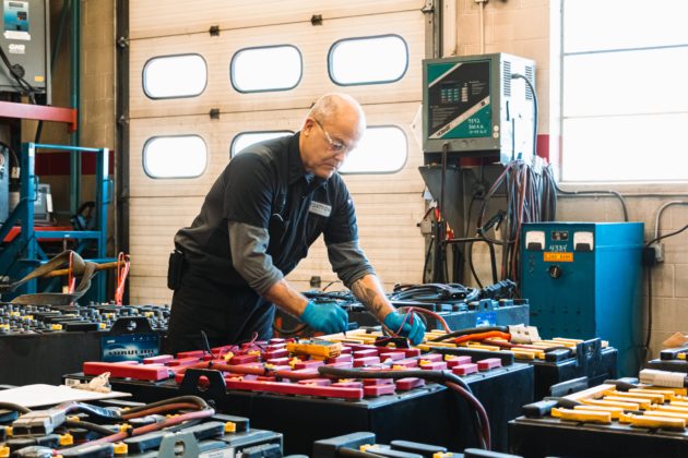 Forklift Battery Maintenance Voltage Testing Wide Shot