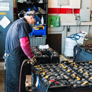 forklift battery repair in action