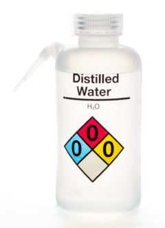 A clear bottle of distilled water