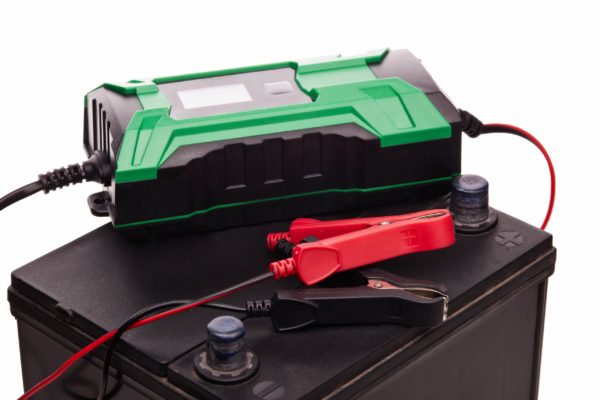 gel-battery-charging A battery with a battery charging sitting on top of it