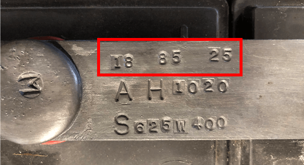A battery intercell connector with the model number stamped