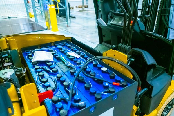 A forklift battery with a watering system connected